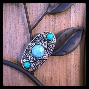 Turquoise and silver brooch